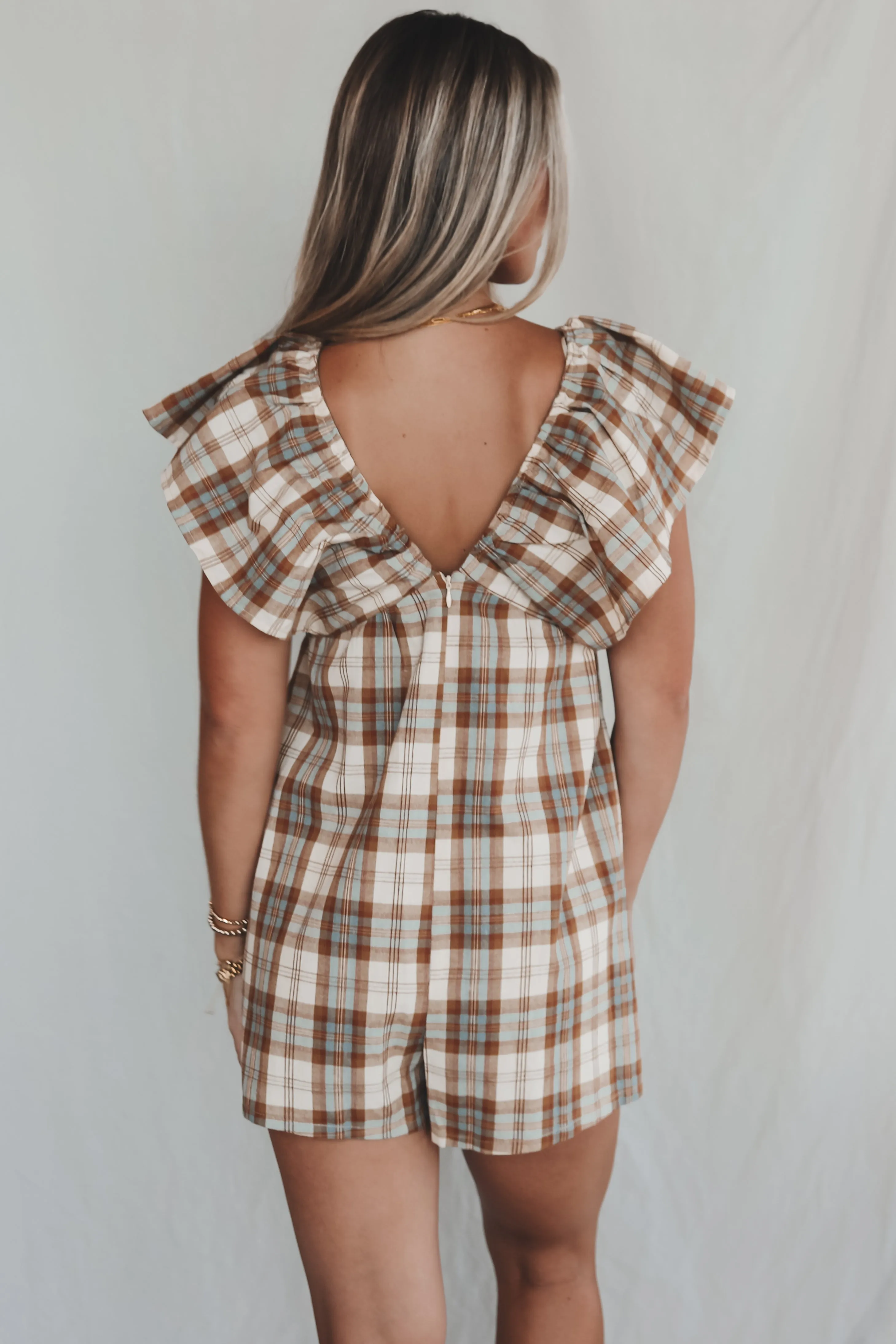 Prove Them Wrong Plaid Ruffle Romper