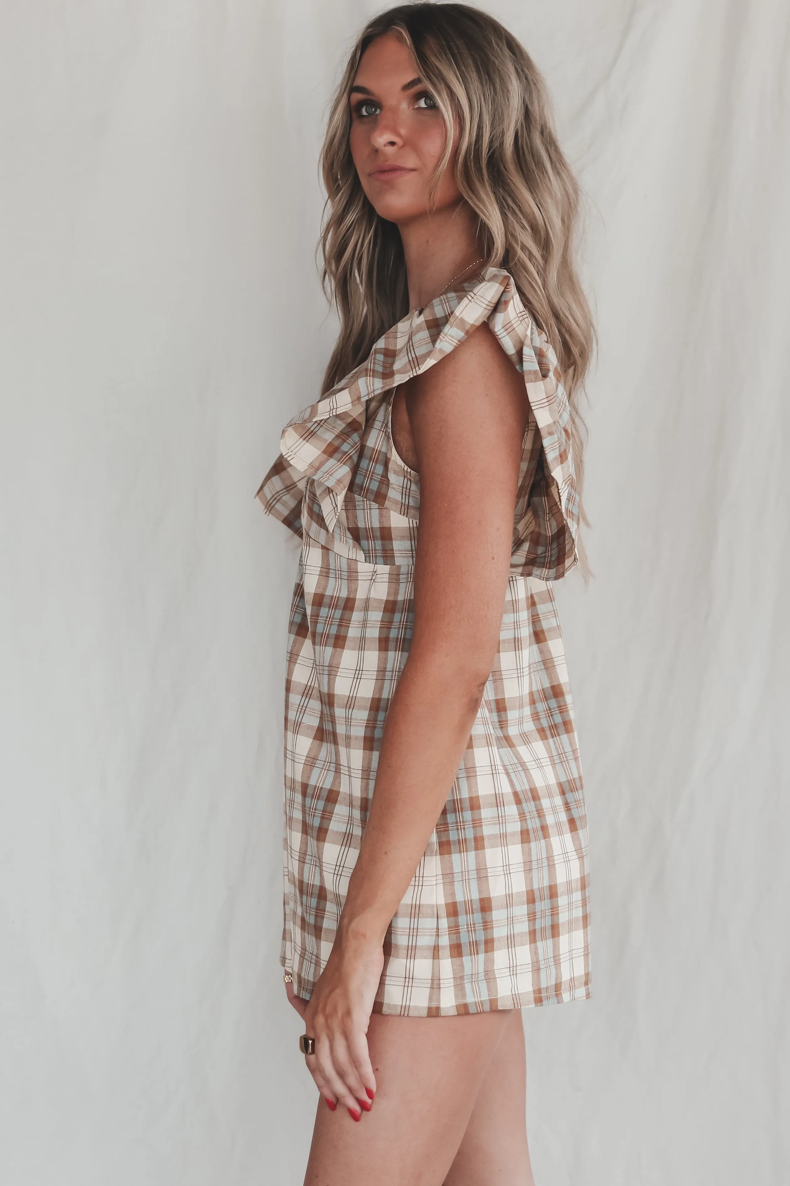 Prove Them Wrong Plaid Ruffle Romper