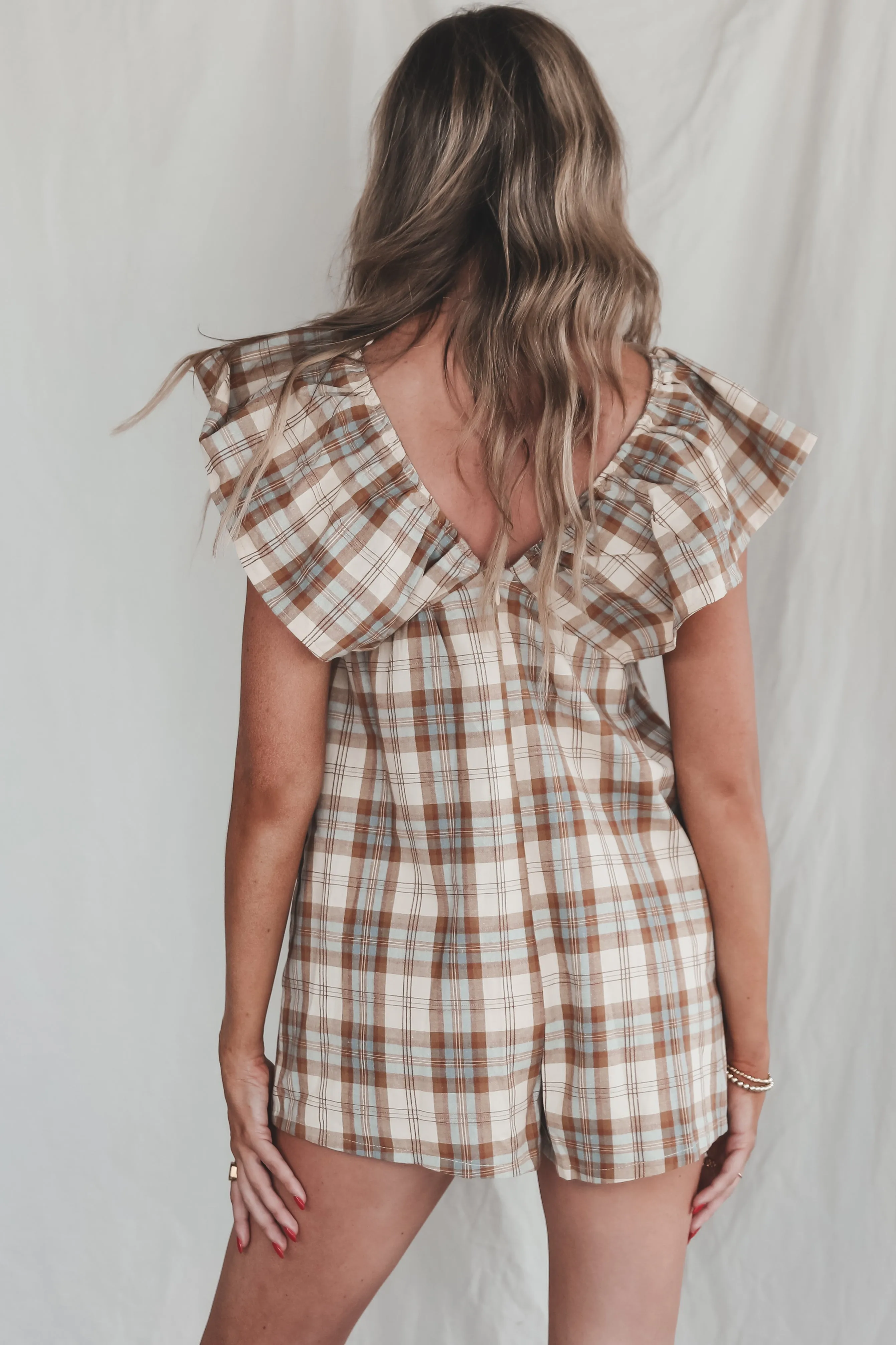 Prove Them Wrong Plaid Ruffle Romper